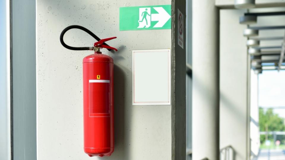 fire extinguisher on wall