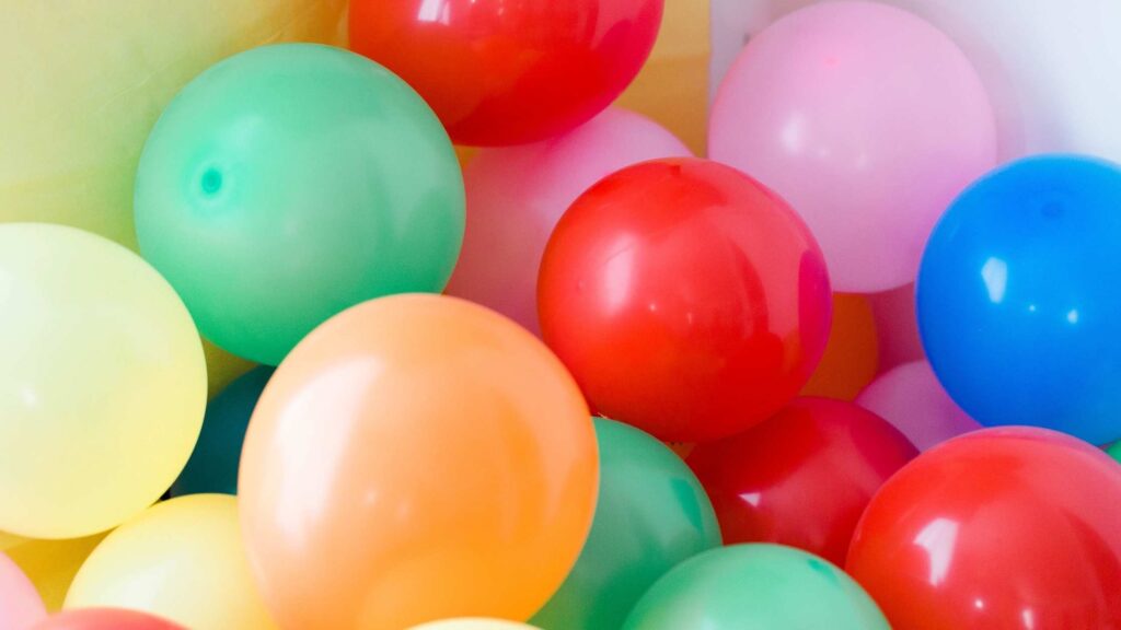 multiple balloons piled together
