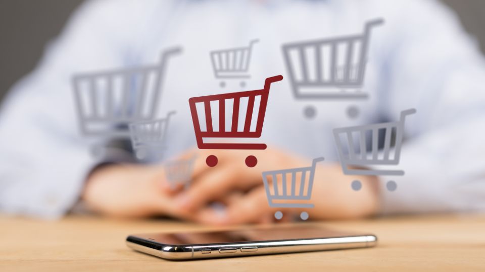 a mobile phone with graphics of shopping carts