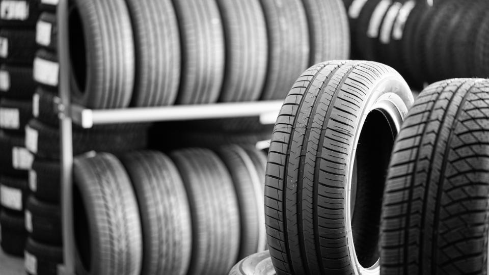 A photograph of some tyres in a garage in the UK