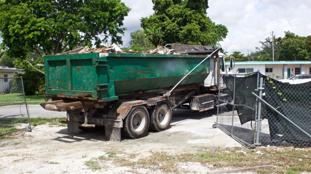 green roll on roll off container on truck
