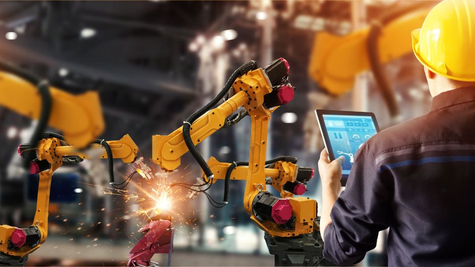 photograph of staff working at a manufacturing site