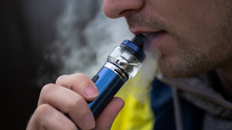 festival-goer vaping at Parklife festival