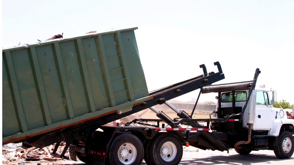 roll on roll off container roro being dropped off by truck