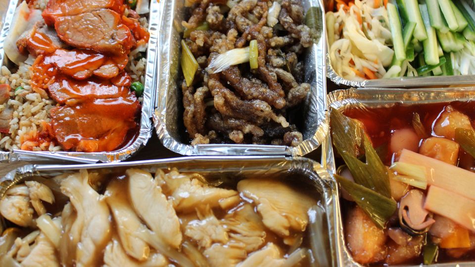 takeaway food from chinese takeaway in plastic single use containers