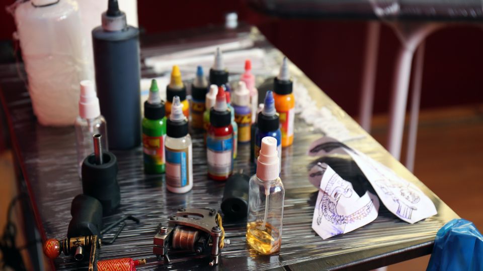 Tattoo tools being used.