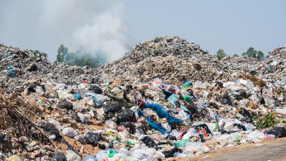 a large landfill site filled with rubbish.