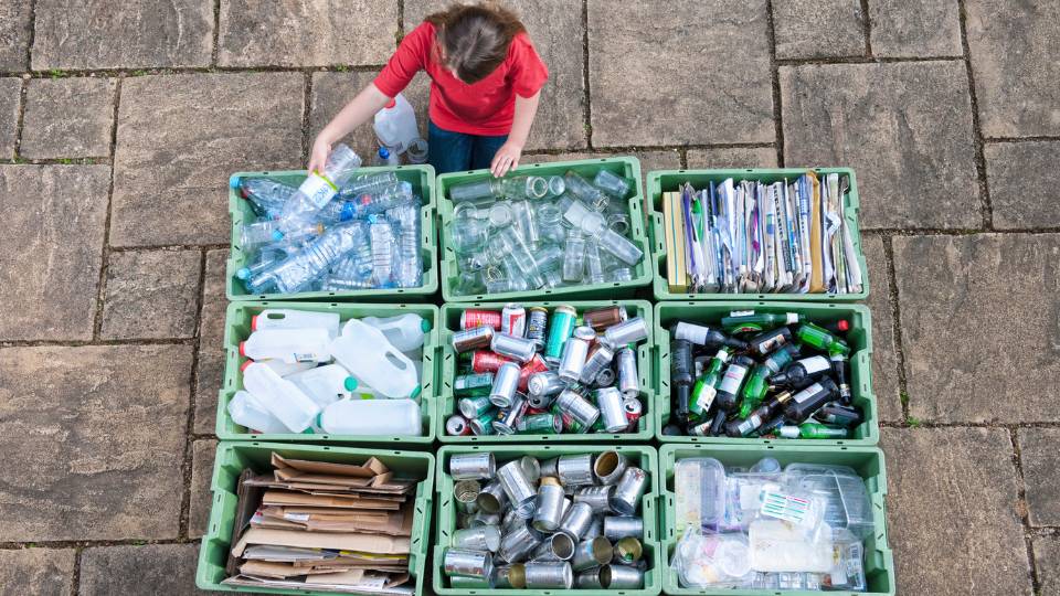 Mixed recycling materials in separate boxes