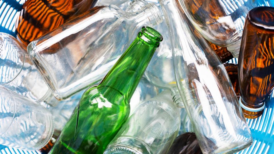 Glass jars and bottles in a basket