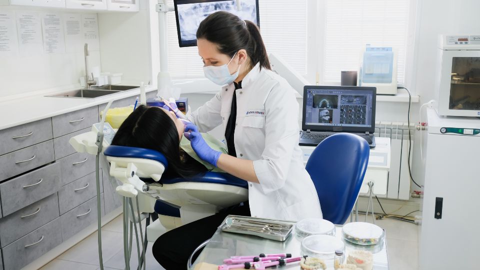 Dentist with a patient