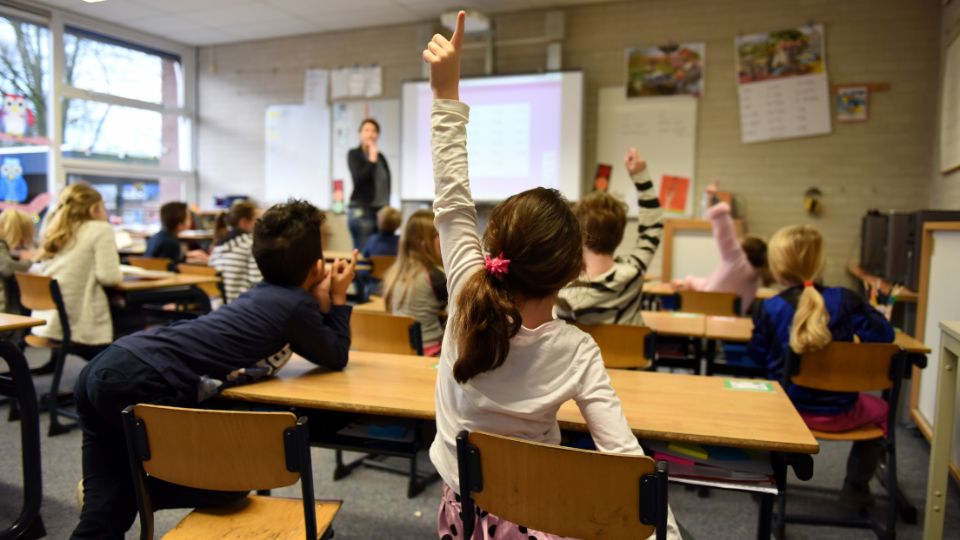 School classroom with children and teacher