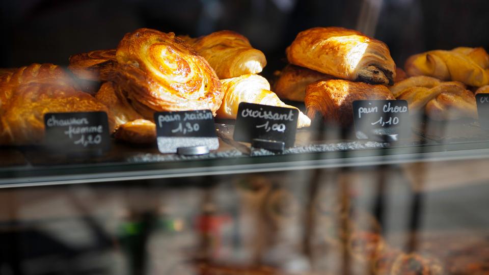 Baked croissants on shelf window