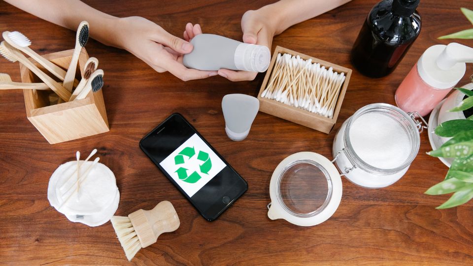 A selection of recycled products on a wooden table