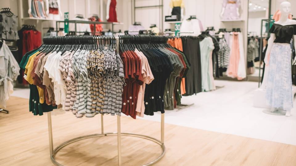 Clothes hung up inside a retail shop