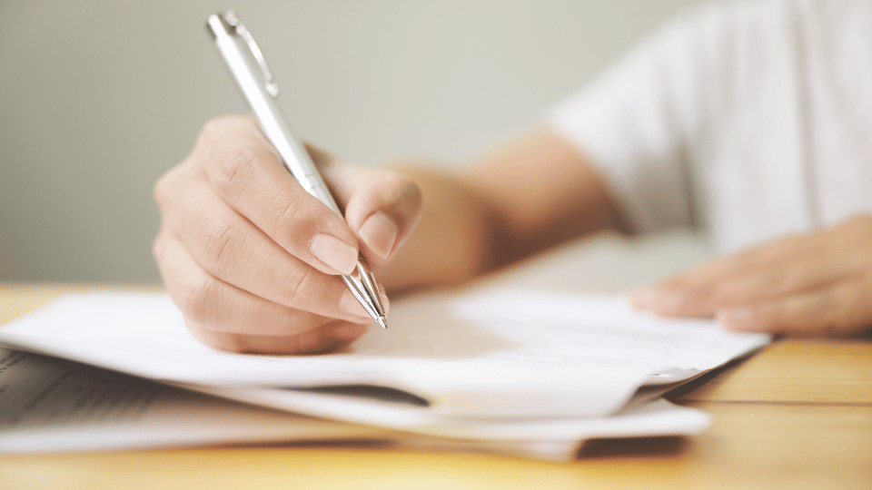 a business owner filling out a duty of care waste transfer note